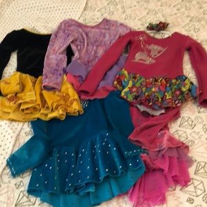 5 figure skating dresses.